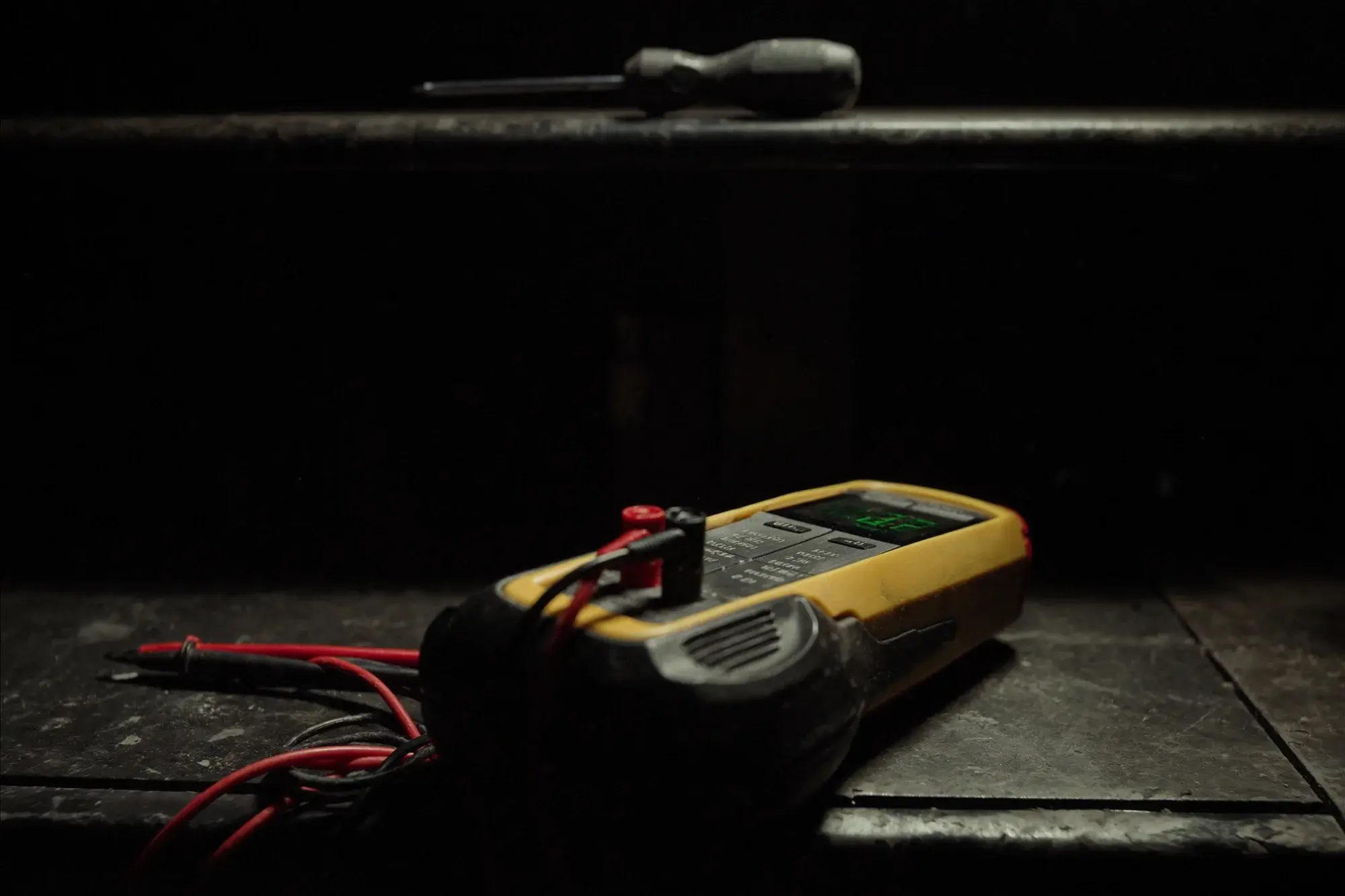 Tester and leads on a workbench
